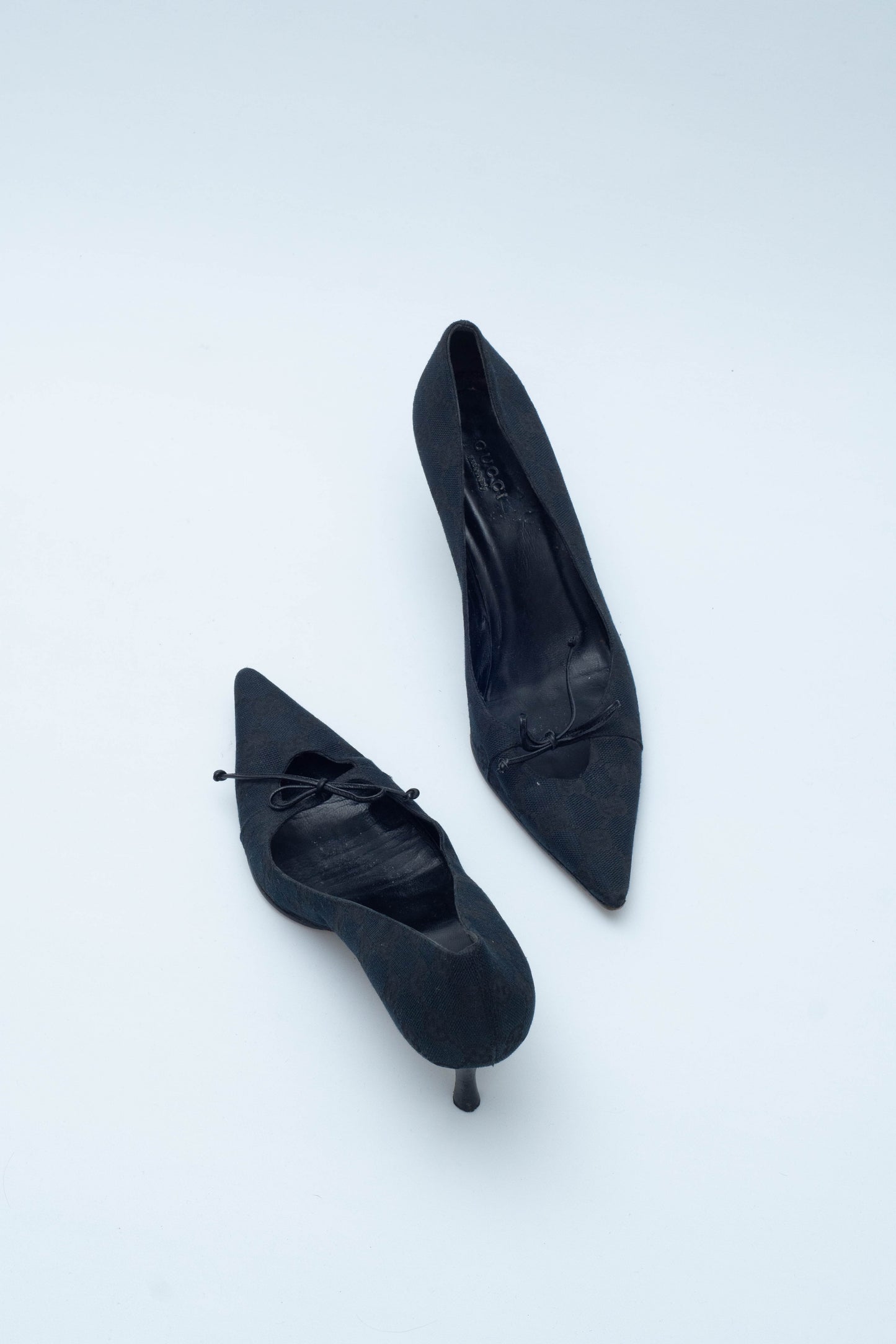 GUCCI BLACK MONOGRAM BOW HEELS