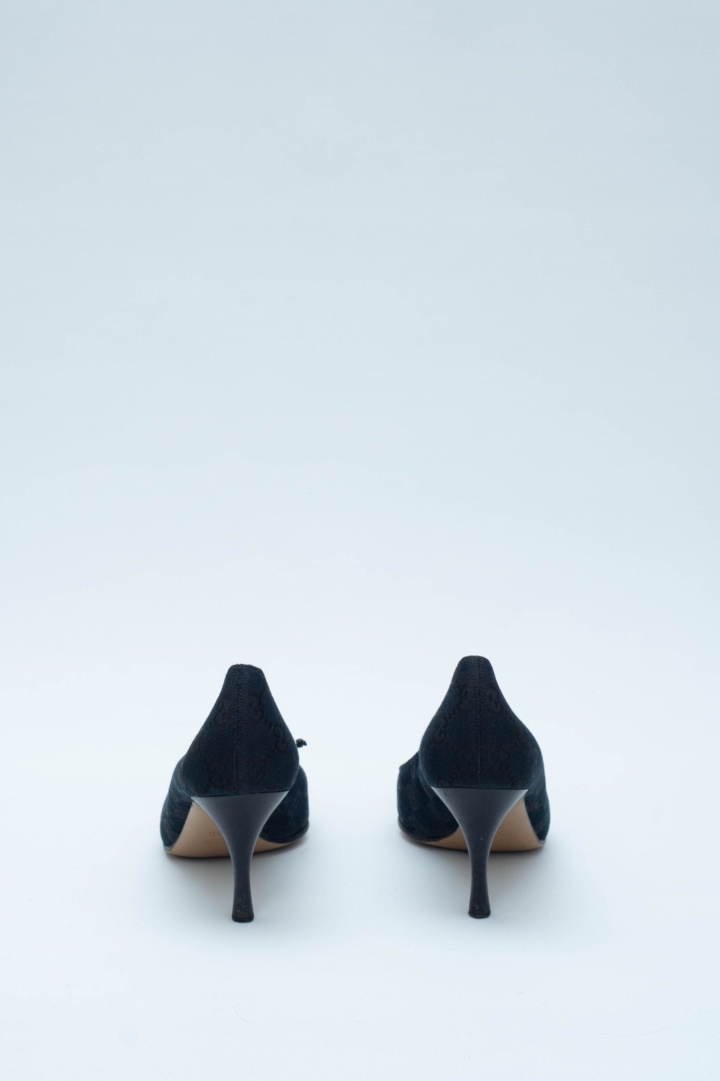 GUCCI BLACK MONOGRAM BOW HEELS