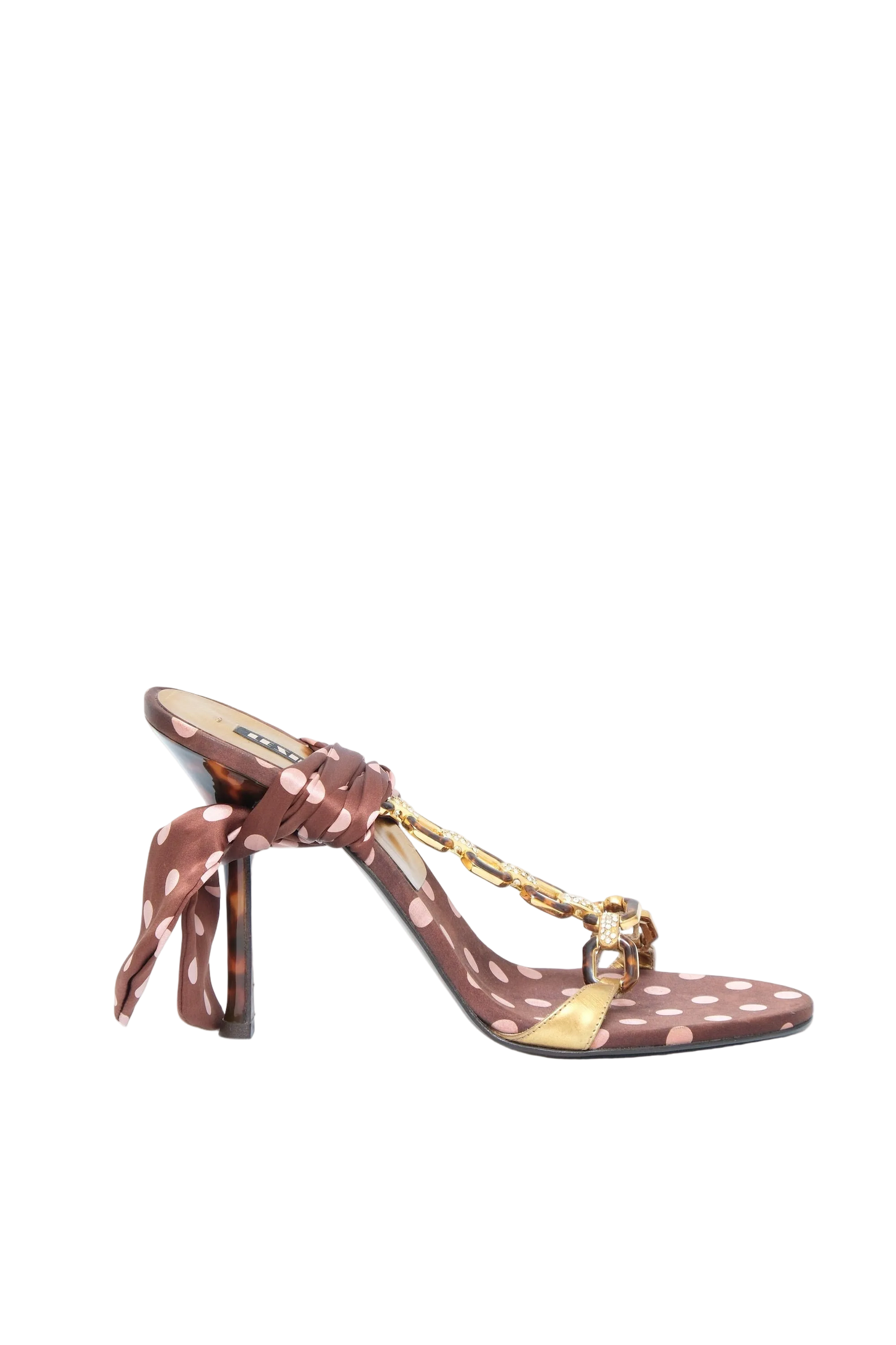 A single brown satin sandal with white polka dots, a high stiletto heel, and a gold chain detail across the toe, shown against a plain white background.