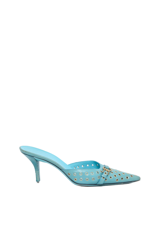 A single light blue pointed-toe mule high heel with gold-tone stud embellishments, shown in profile against a clean white background.