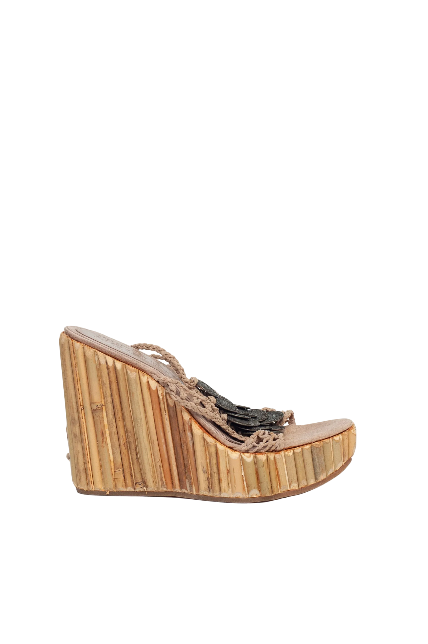 Woven wedge sandal with decorative straps on a white background
