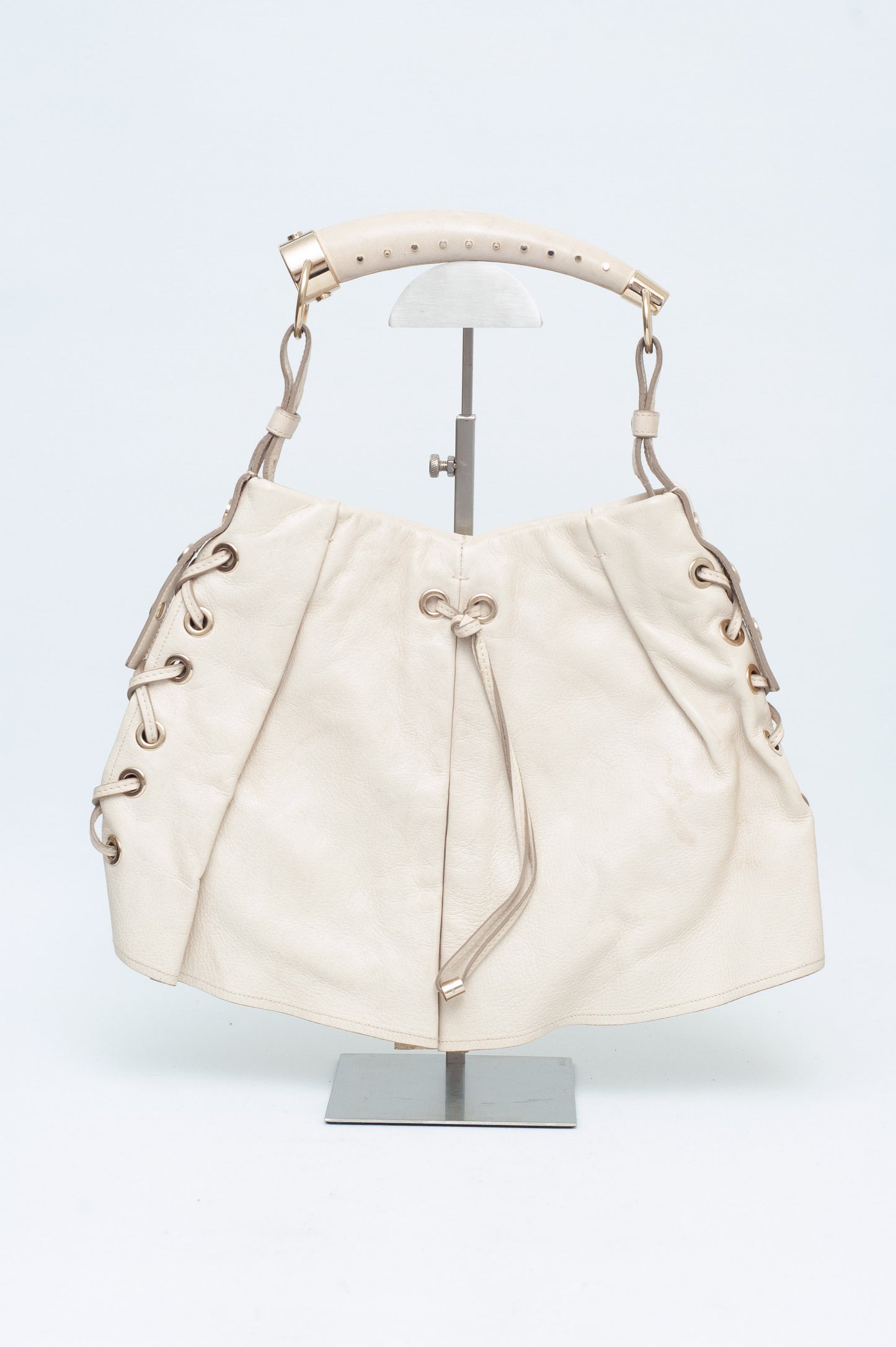 Beige handbag on a white background