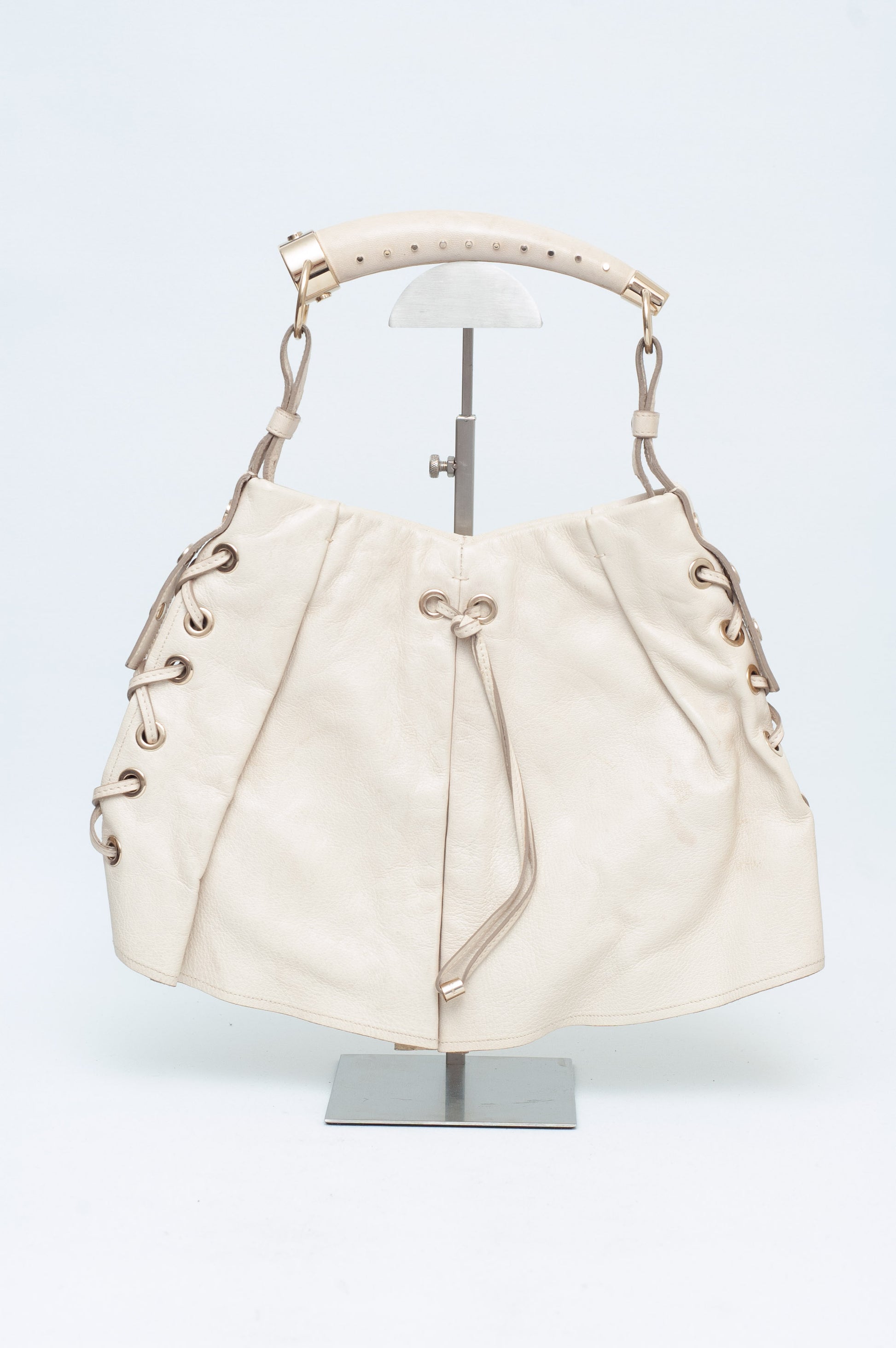 Beige handbag on a white background
