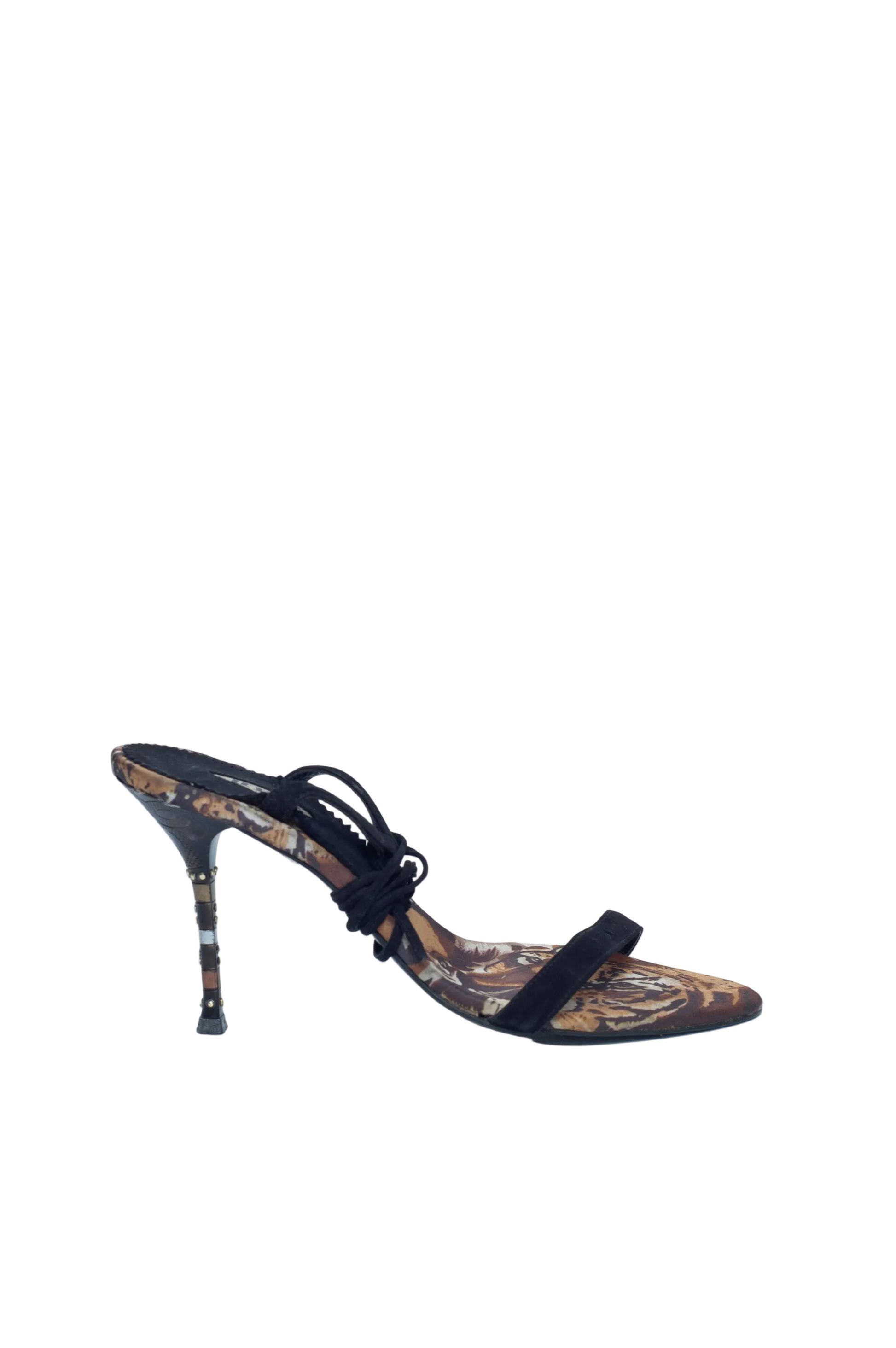 High-heeled shoe with intricate design on a white background