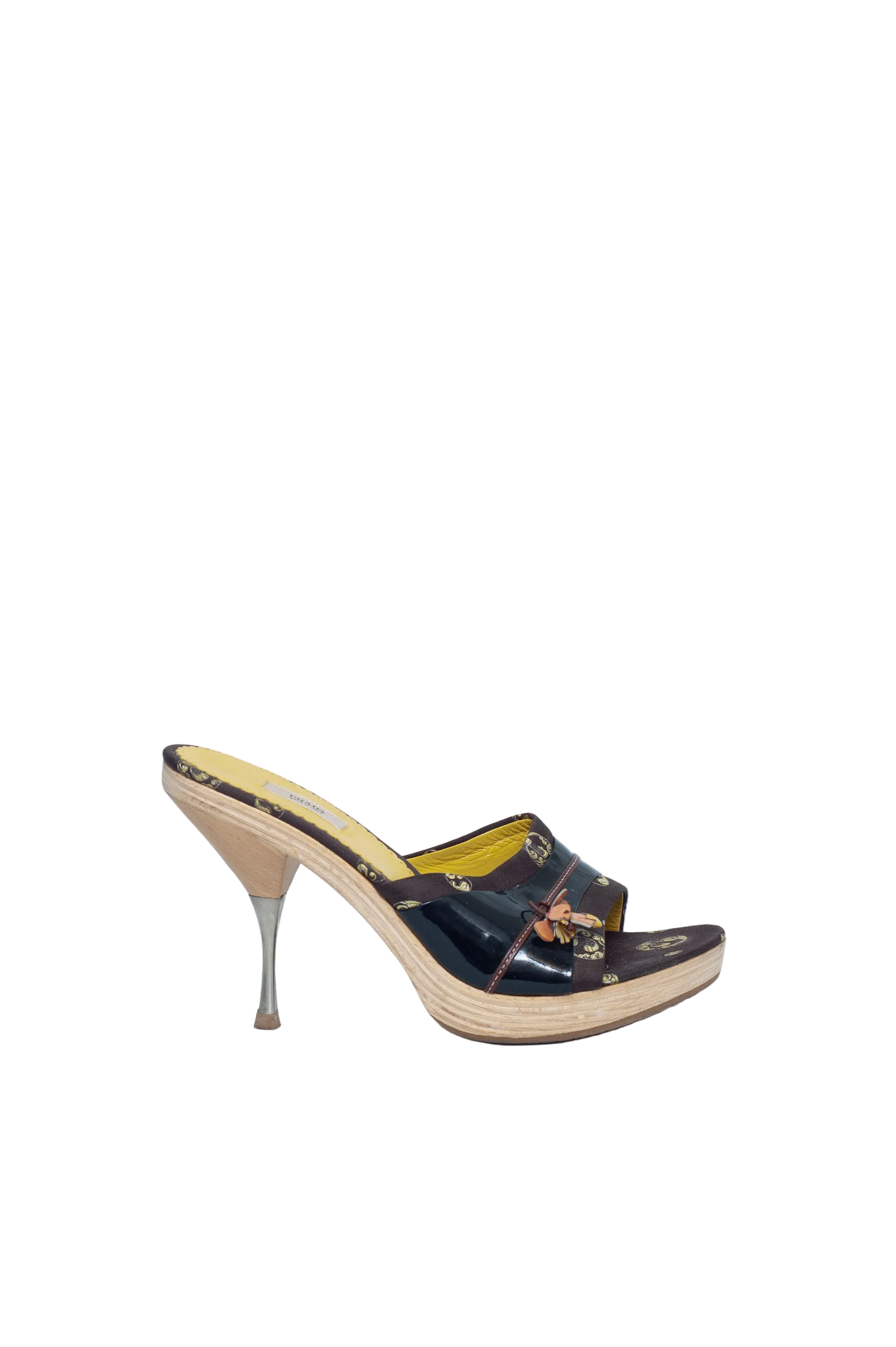 High-heeled shoe on a light blue background